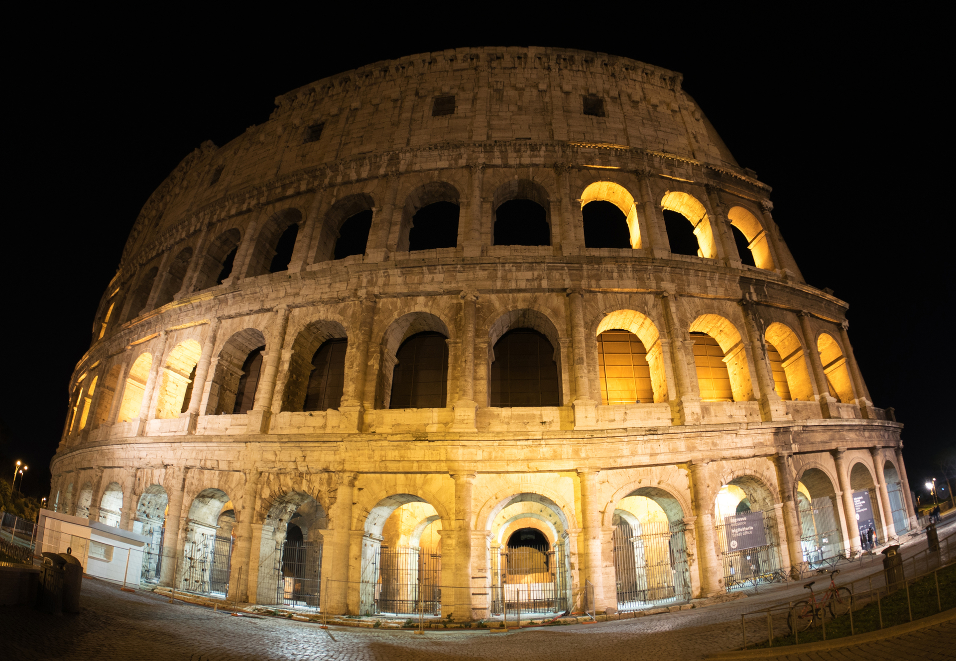 The Colosseum in Rome illuminated at dusk